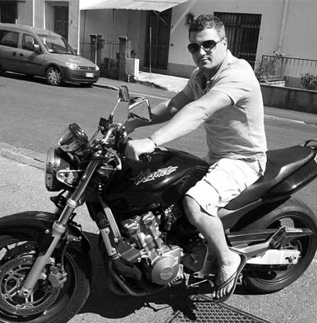 Oprea Robert Valentin, the owner of Remap Auto Tuning on a Honda Hornet bike in Wrexham